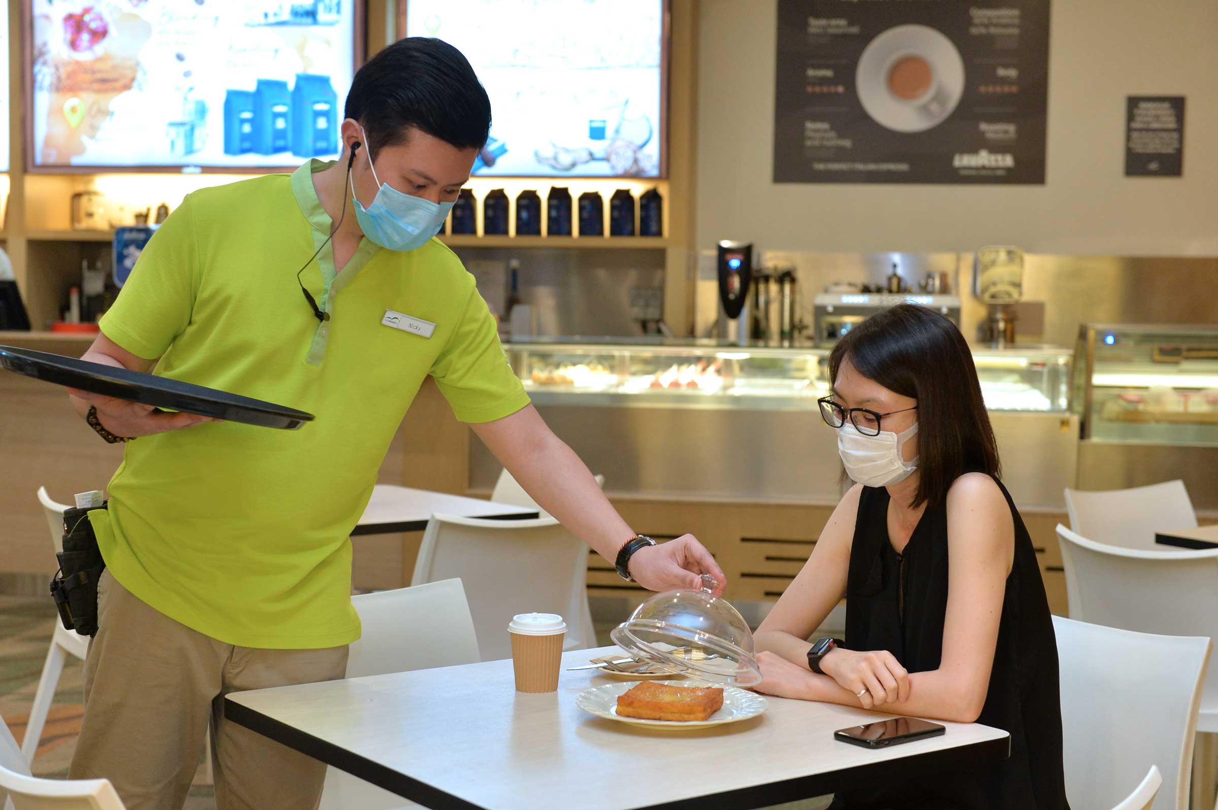 Food handlers working in open kitchens and food concessions are required to wear face masks